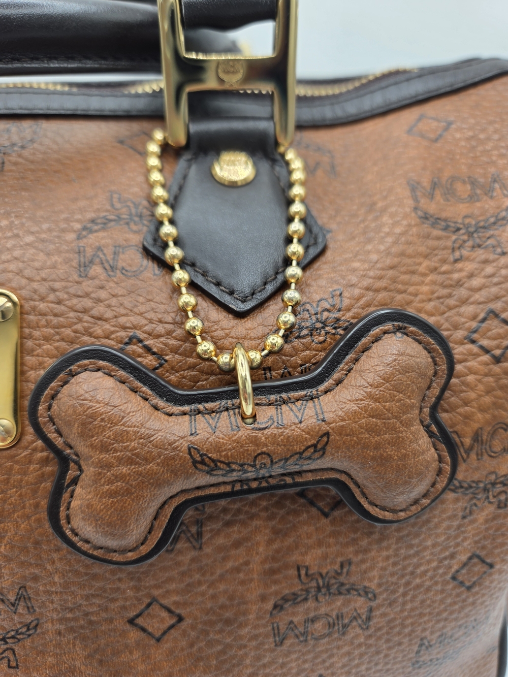 Authentic MCM Cognac Dog Bone Bag Charm
